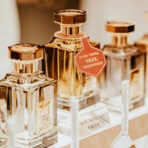 Elegant collection of perfume bottles showcasing luxury fragrances in a stylish retail display.