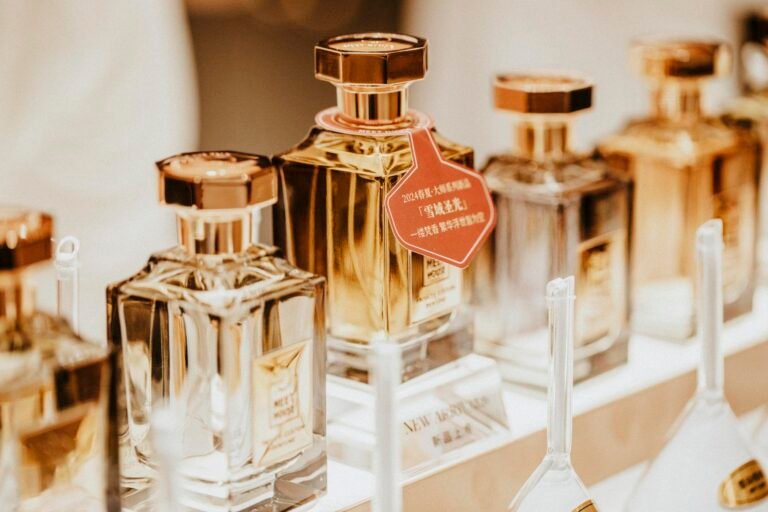 Elegant collection of perfume bottles showcasing luxury fragrances in a stylish retail display.